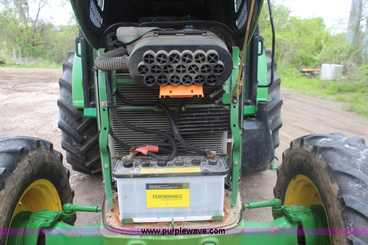 image for item K6868 2010 John Deere 6330 MFWD tractor