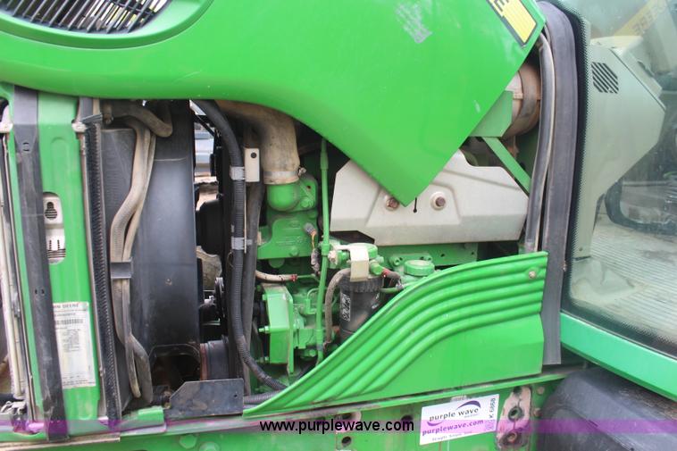 image for item K6868 2010 John Deere 6330 MFWD tractor