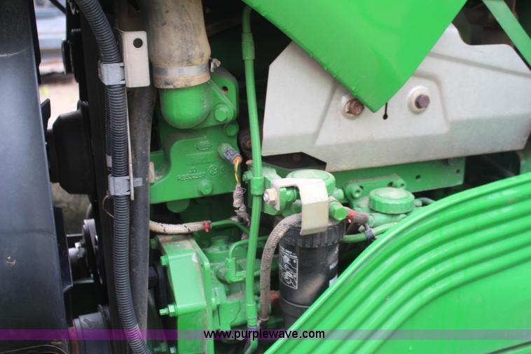 image for item K6868 2010 John Deere 6330 MFWD tractor