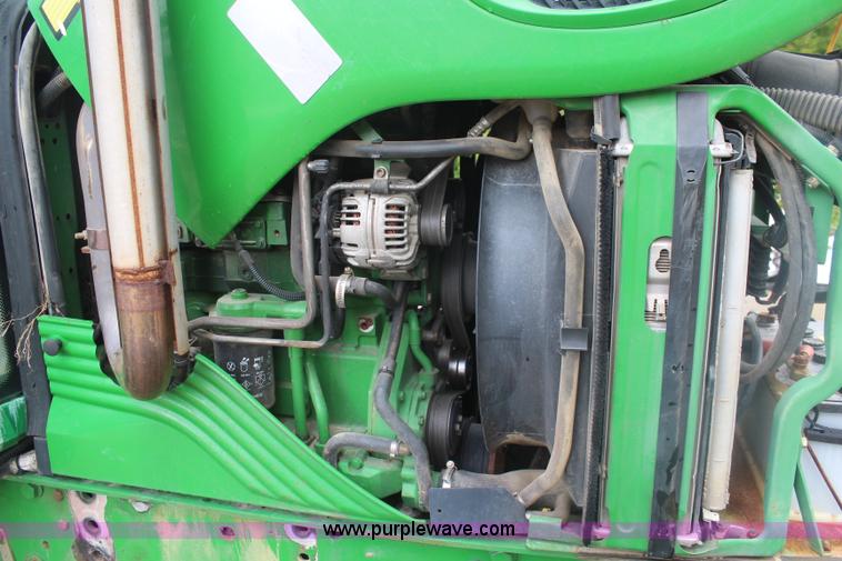 image for item K6868 2010 John Deere 6330 MFWD tractor