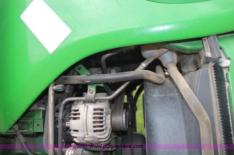 image for item K6868 2010 John Deere 6330 MFWD tractor