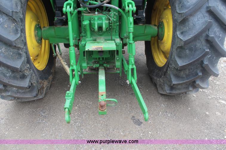 image for item K6868 2010 John Deere 6330 MFWD tractor