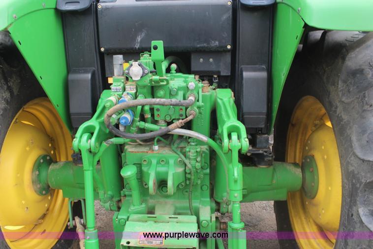 image for item K6868 2010 John Deere 6330 MFWD tractor