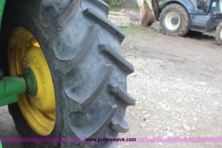 image for item K6868 2010 John Deere 6330 MFWD tractor