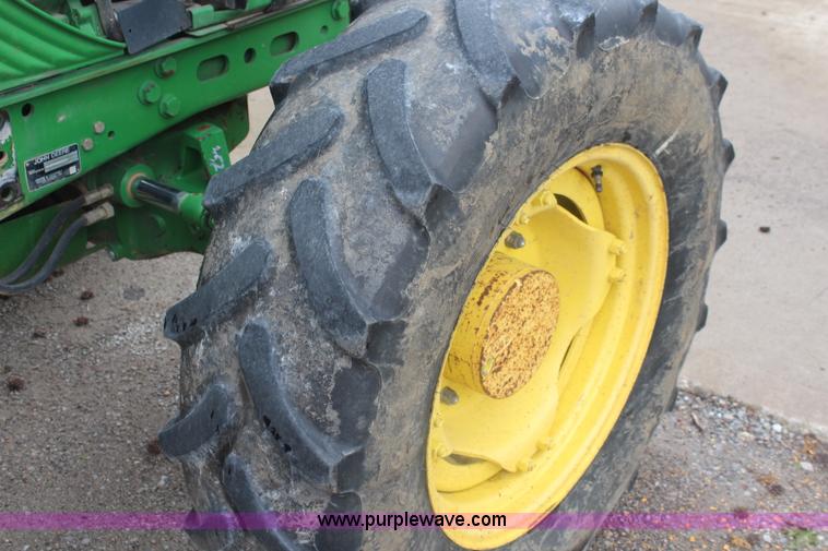 image for item K6868 2010 John Deere 6330 MFWD tractor