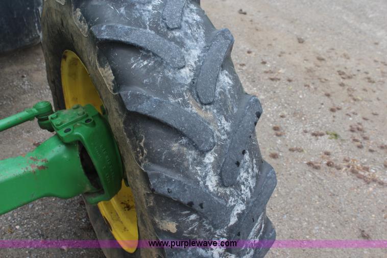 image for item K6868 2010 John Deere 6330 MFWD tractor