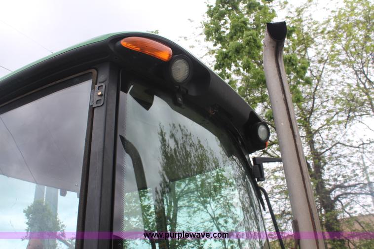 image for item K6868 2010 John Deere 6330 MFWD tractor