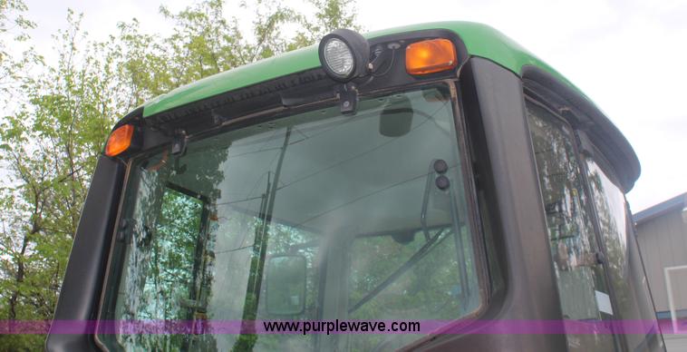 image for item K6868 2010 John Deere 6330 MFWD tractor