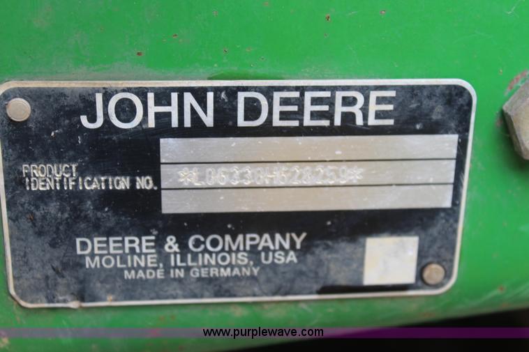 image for item K6868 2010 John Deere 6330 MFWD tractor