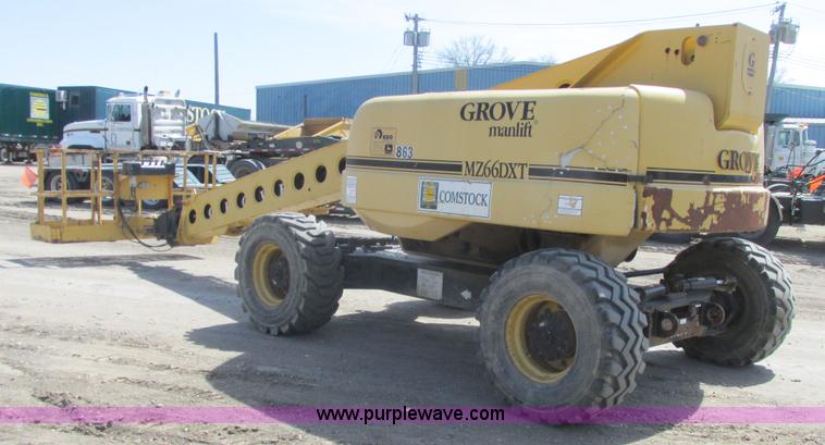 image for item A8791 1999 Grove MZ66DXT boom lift