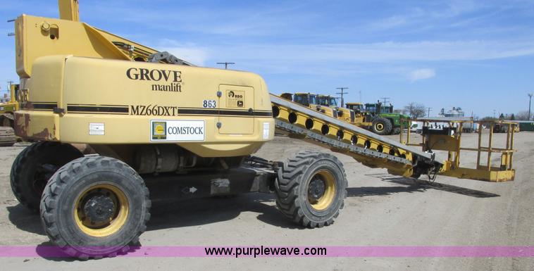 image for item A8791 1999 Grove MZ66DXT boom lift