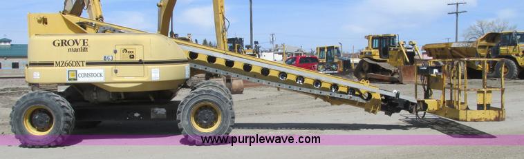 image for item A8791 1999 Grove MZ66DXT boom lift