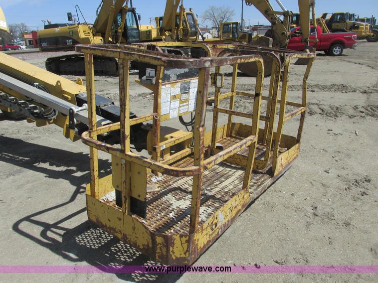 image for item A8791 1999 Grove MZ66DXT boom lift