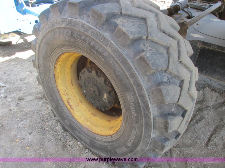 image for item A8791 1999 Grove MZ66DXT boom lift