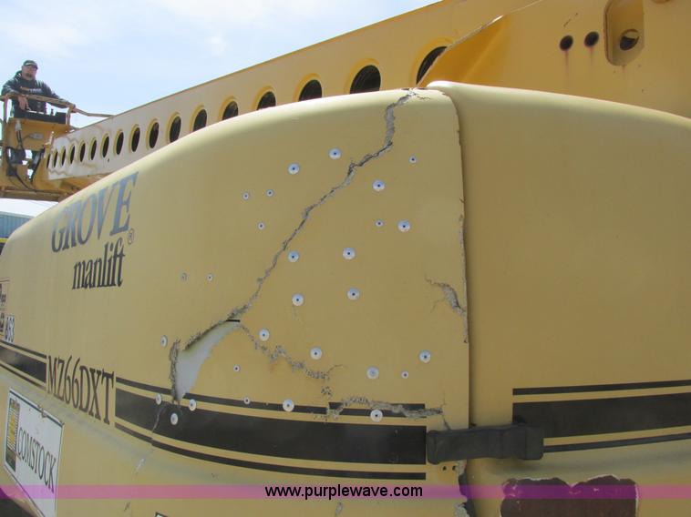 image for item A8791 1999 Grove MZ66DXT boom lift