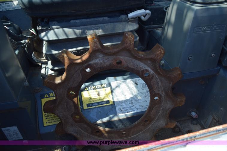 image for item E6345 Takeuchi TL250 skid steer