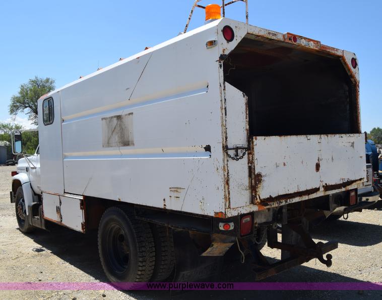 image for item E6346 1990 GMC TopKick chipper truck