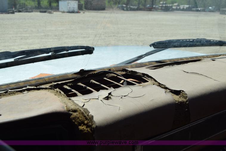 image for item E6346 1990 GMC TopKick chipper truck