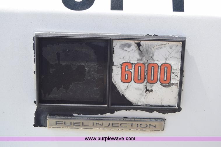 image for item E6346 1990 GMC TopKick chipper truck