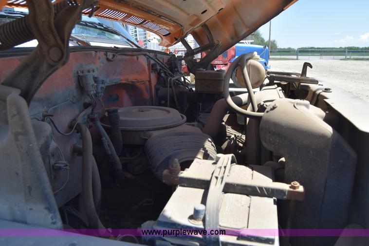 image for item E6346 1990 GMC TopKick chipper truck