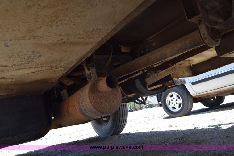 image for item E6346 1990 GMC TopKick chipper truck