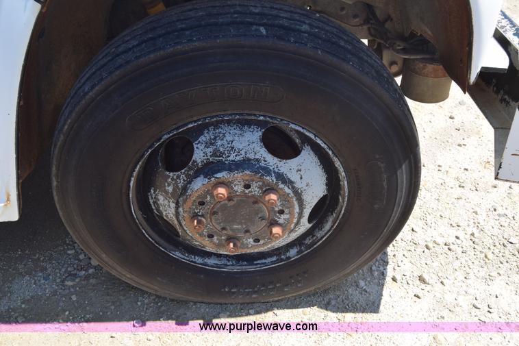 image for item E6346 1990 GMC TopKick chipper truck