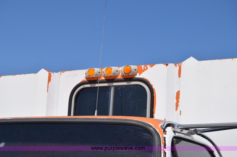 image for item E6346 1990 GMC TopKick chipper truck