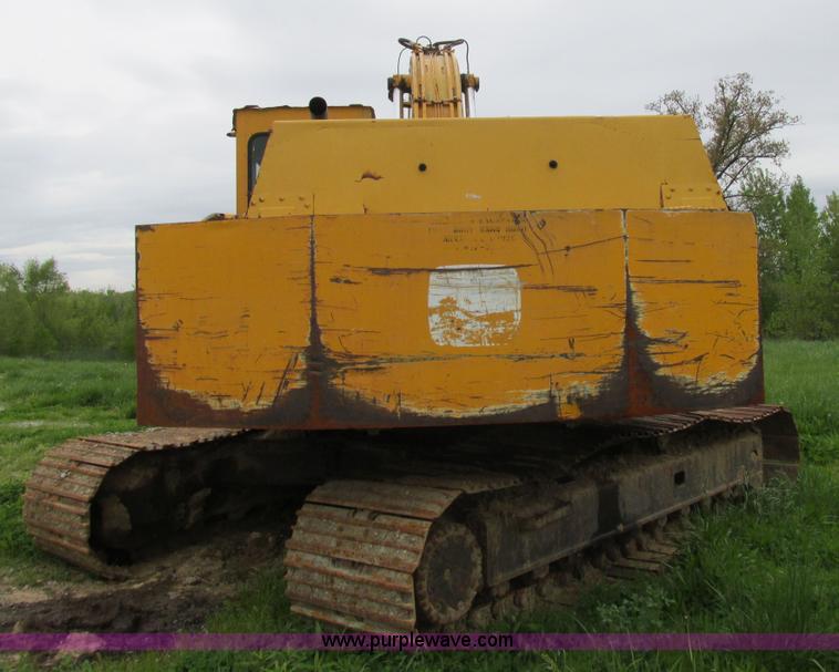 image for item E7444 1986 John Deere 790 excavator