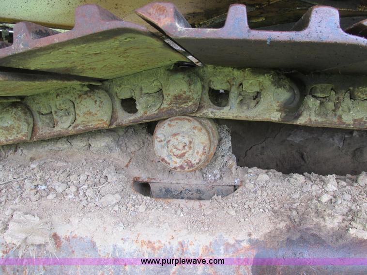 image for item E7444 1986 John Deere 790 excavator