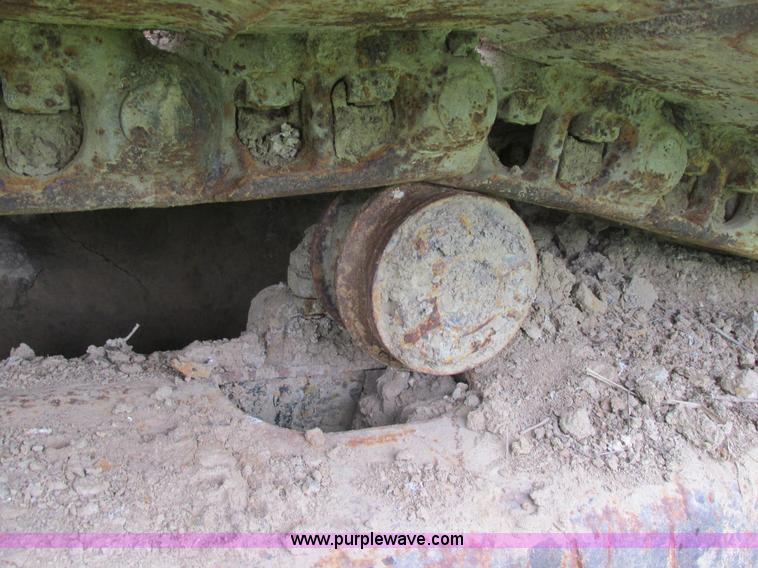 image for item E7444 1986 John Deere 790 excavator