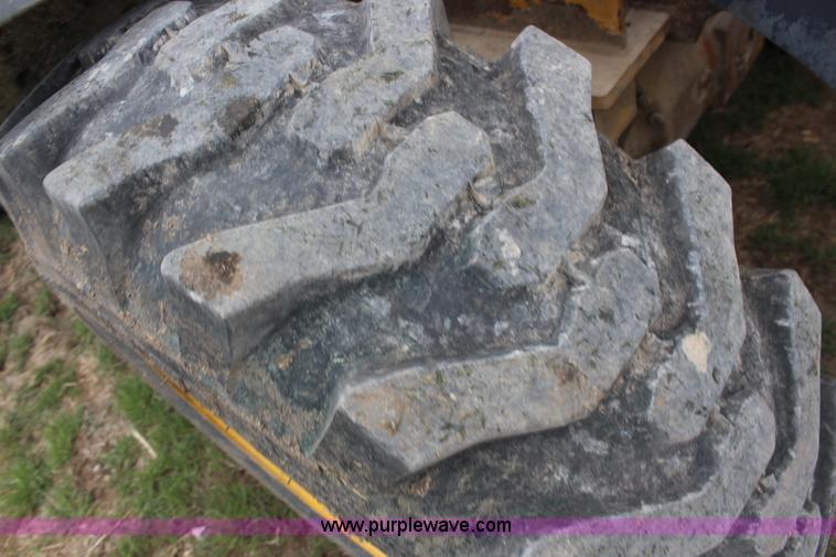 image for item F7680 2008 John Deere 244J wheel loader