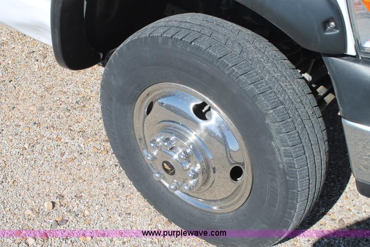 image for item H1515 2010 Dodge Ram 3500 Quad Cab utilty truck