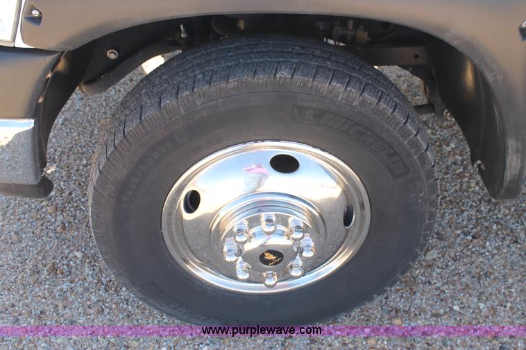 image for item H1515 2010 Dodge Ram 3500 Quad Cab utilty truck