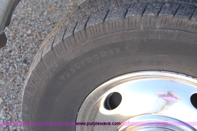 image for item H1515 2010 Dodge Ram 3500 Quad Cab utilty truck