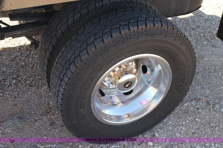 image for item H1515 2010 Dodge Ram 3500 Quad Cab utilty truck