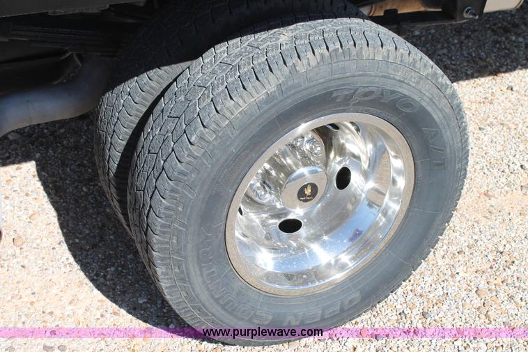 image for item H1515 2010 Dodge Ram 3500 Quad Cab utilty truck