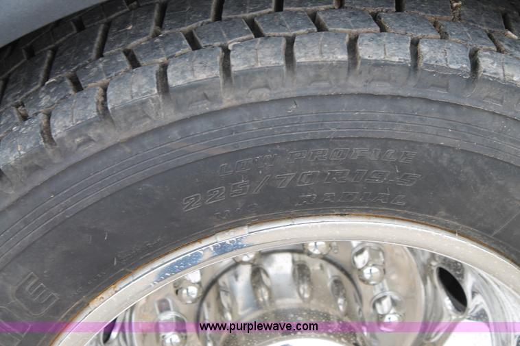 image for item H1517 2008 Dodge Ram 5500 Quad Cab utility truck