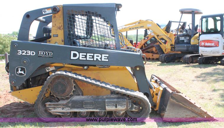 image for item H5824 2011 John Deere 323DT skid steer