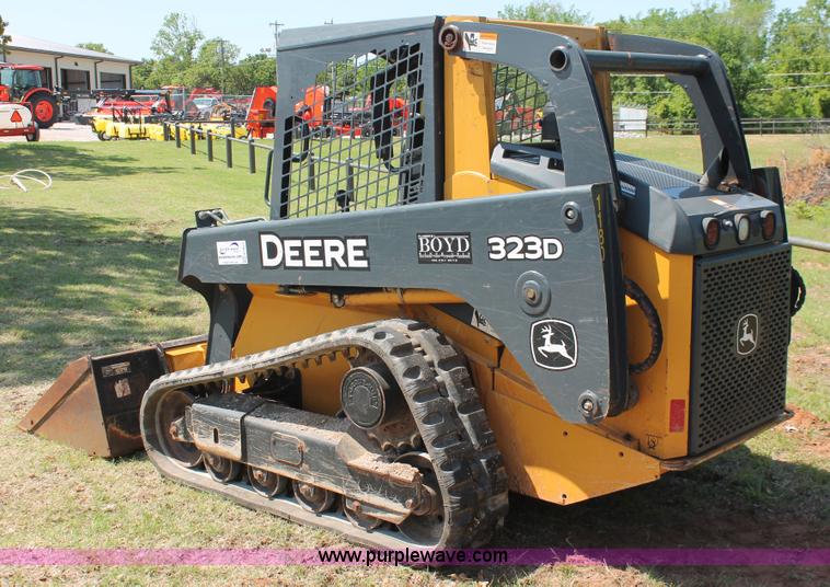 image for item H5824 2011 John Deere 323DT skid steer
