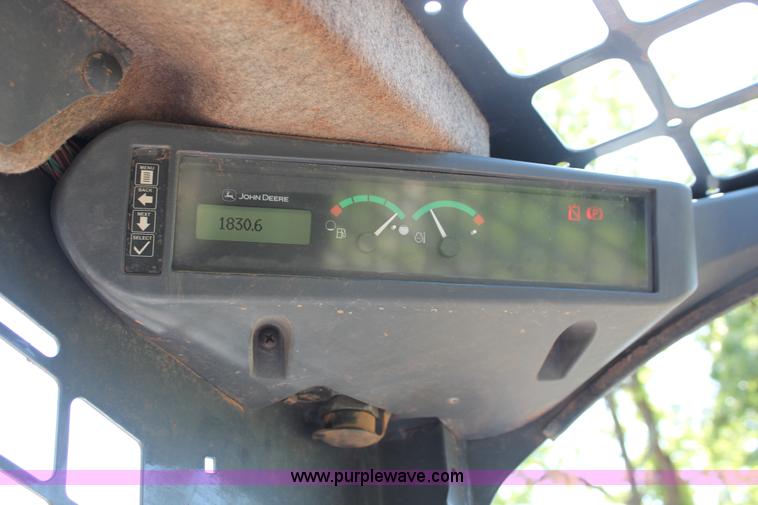 image for item H5824 2011 John Deere 323DT skid steer