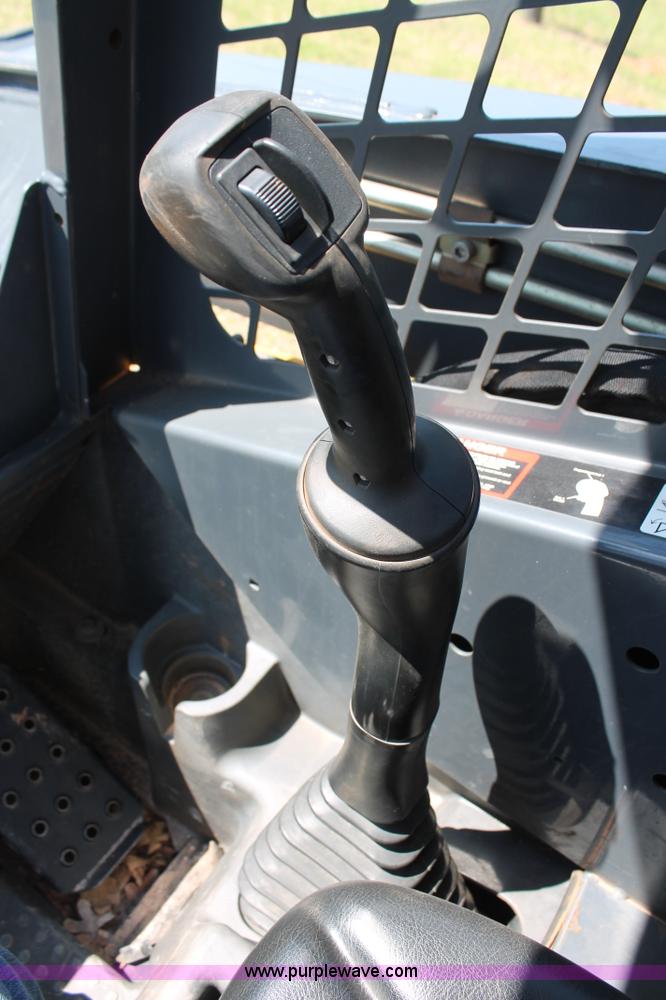 image for item H5824 2011 John Deere 323DT skid steer