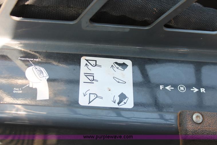 image for item H5824 2011 John Deere 323DT skid steer