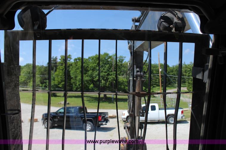 image for item I1673 2008 John Deere 200LC excavator