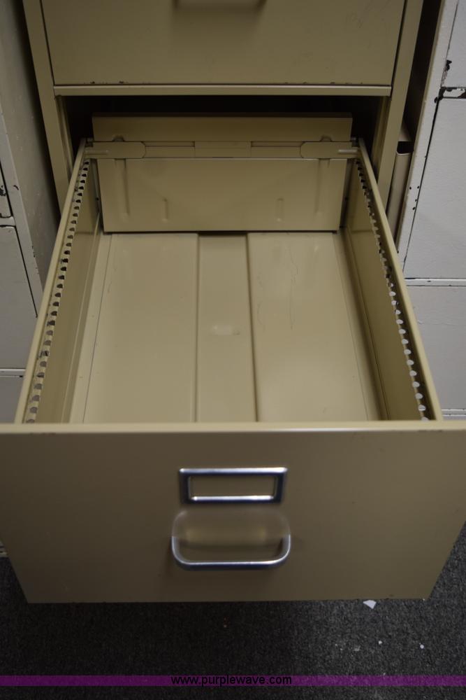 image for item AQ9210 (4) filing cabinets