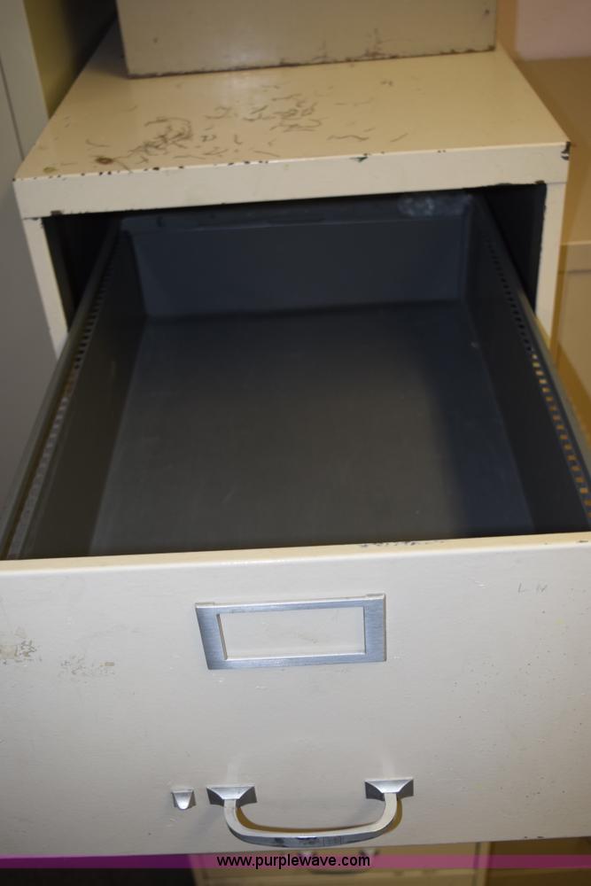 image for item AQ9210 (4) filing cabinets