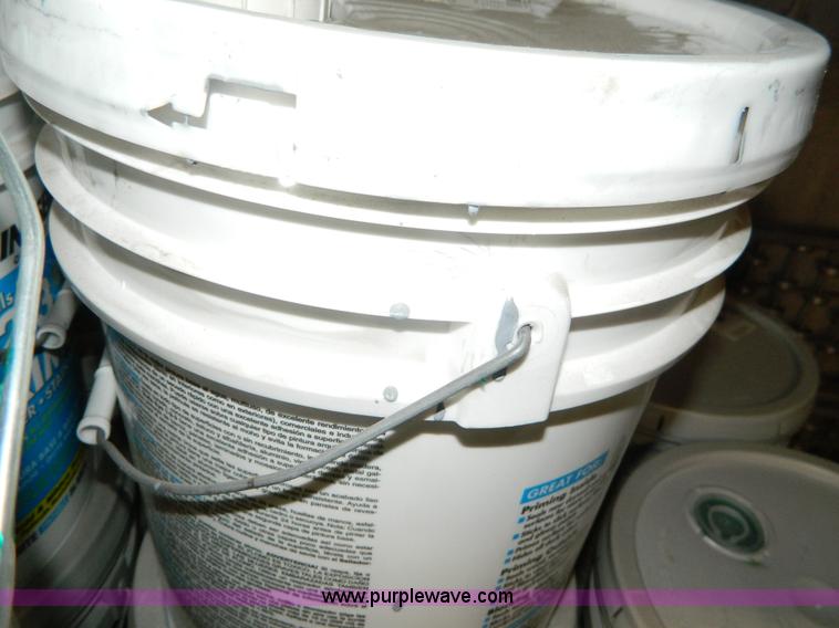 image for item AX9870 (14) five gallon cans of Sherwin Williams latex paint