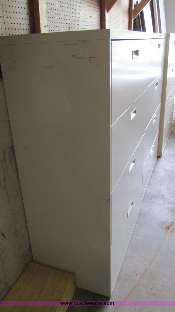 image for item AY9896 (3) four drawer file cabinets