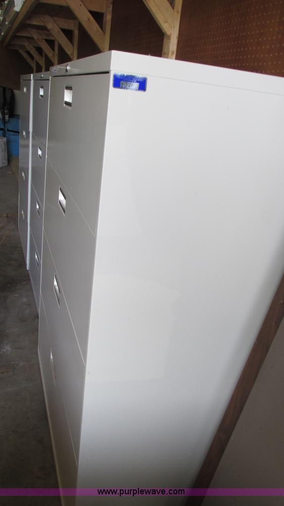 image for item AY9896 (3) four drawer file cabinets