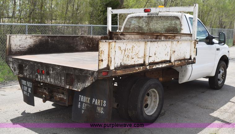 image for item H5151 2000 Ford F350 Super Duty flatbed pickup truck