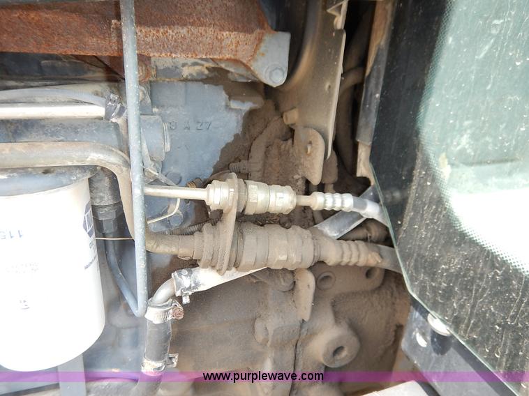 image for item J3955 1998 New Holland TS100 tractor